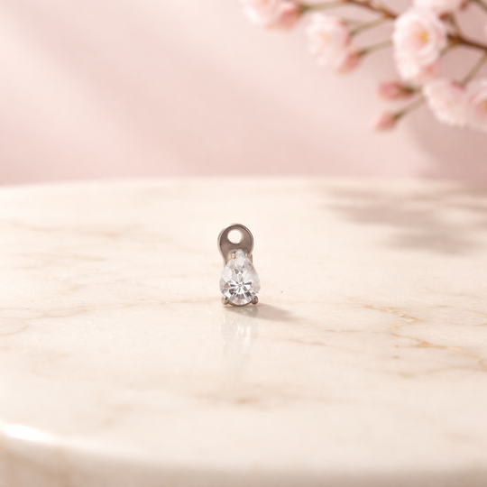 G23-DM20 - 14g G23 Titanium Dermal Anchor paired with a Surgical Steel 4mm x 3mm Pear‑Shaped Clear CZ Top (Pack of 6)