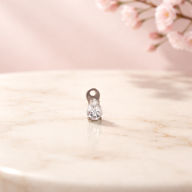 G23-DM20 - 14g G23 Titanium Dermal Anchor paired with a Surgical Steel 4mm x 3mm Pear‑Shaped Clear CZ Top (Pack of 6)